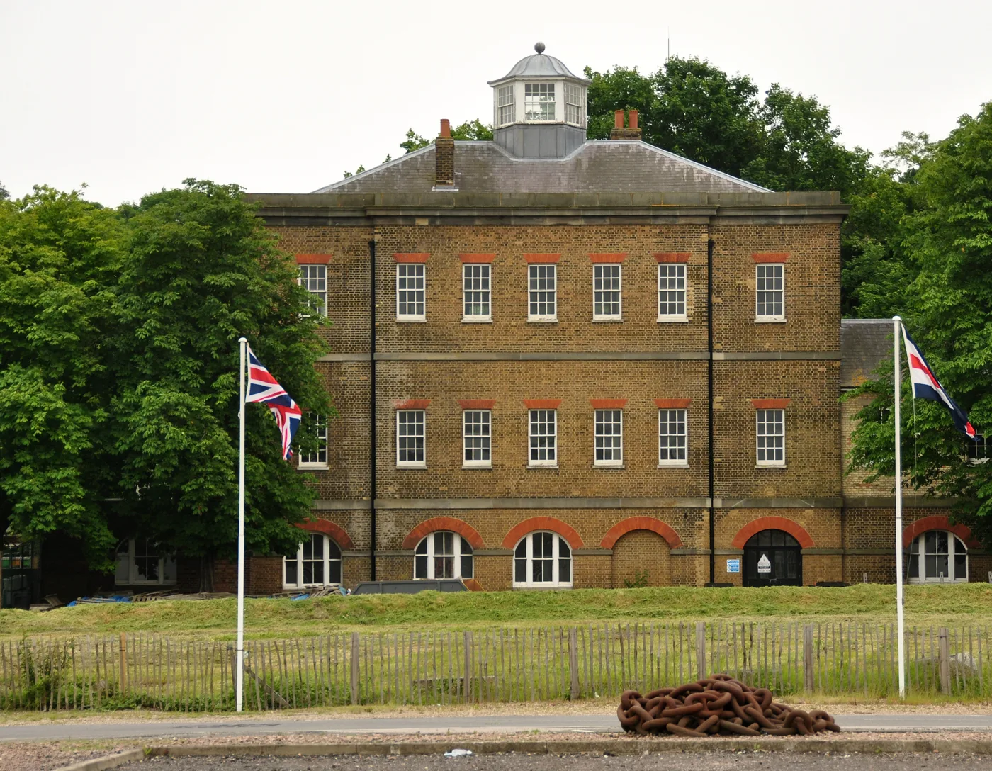 The former Police Section House at Chatham Historic Dockyard, the building being converted into Docking Station. The proposed road is aligned on the centre of the building and its roof lantern