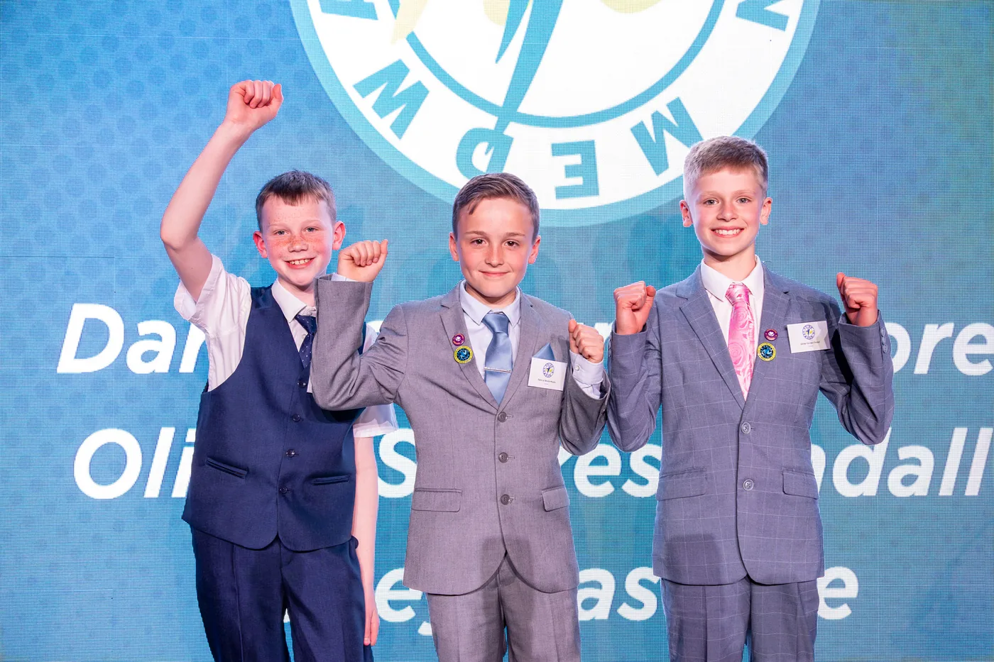 Dara Le Brunn-Moore, Oliver Szczes-Tindall and Tobey Batstone on stage as the overall winners of the 2026 Pride in Medway Awards